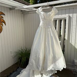 Mon Cheri Elegant Ivory Wedding Dress